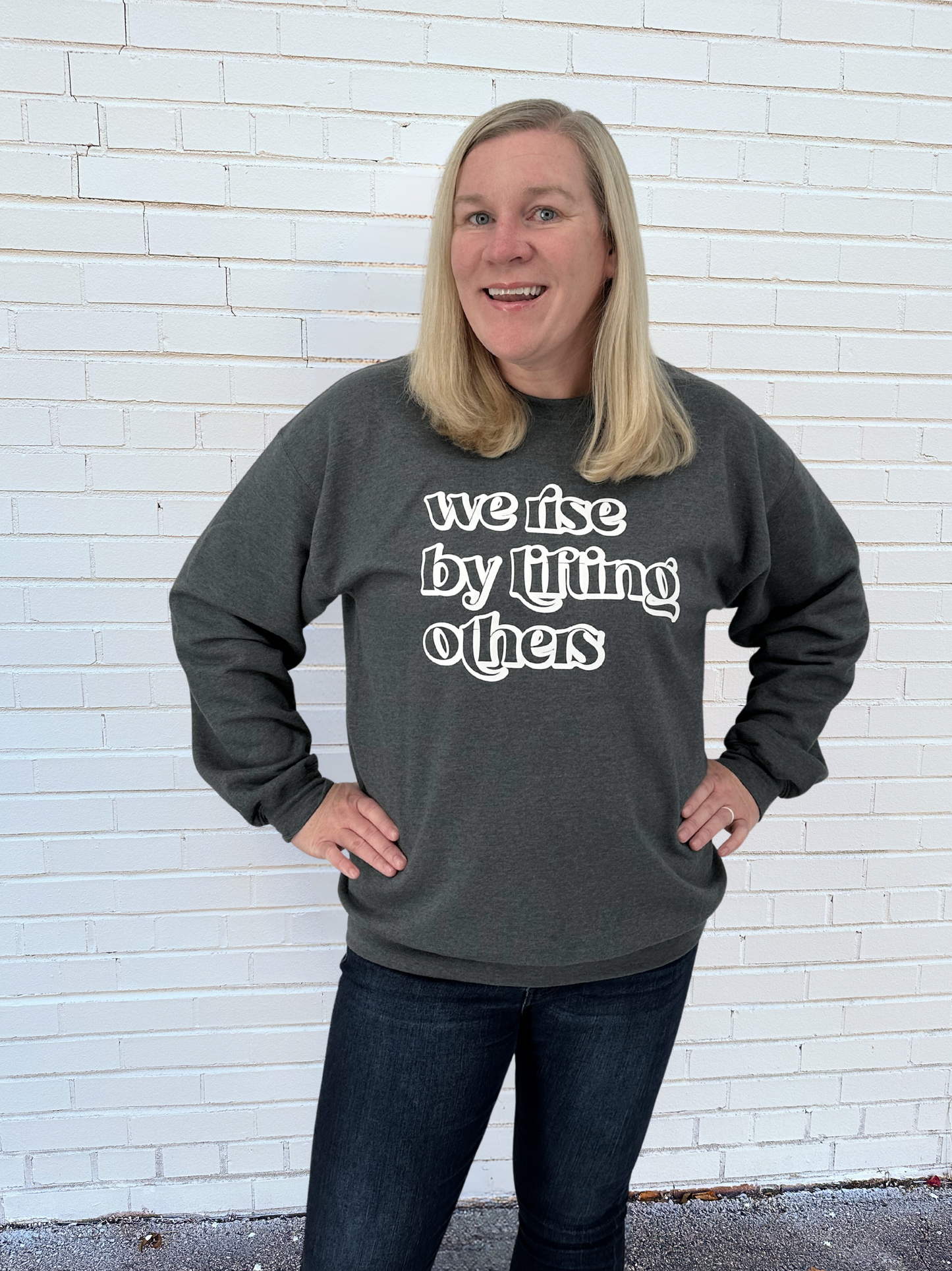 We Rise By Lifting Others Sweatshirt